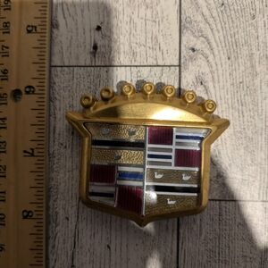cadillac Gold and Red Car Emblem